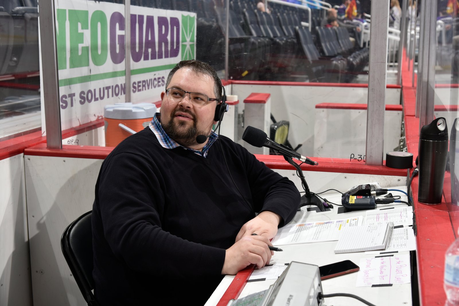 Bryan announcing from the PA booth at Amway Center