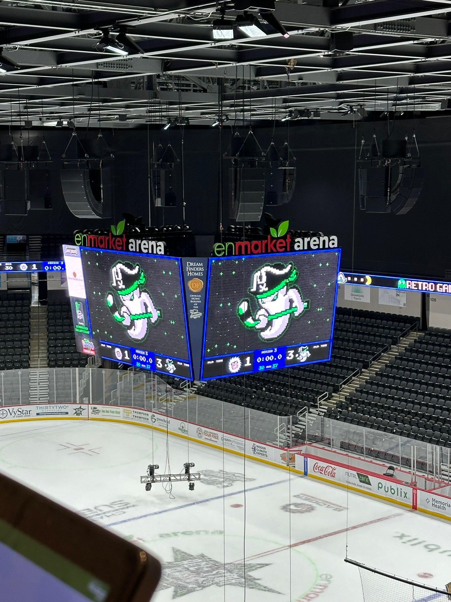 8-bit Pac-Man style scoreboard graphic with the Ghost Pirates mascot