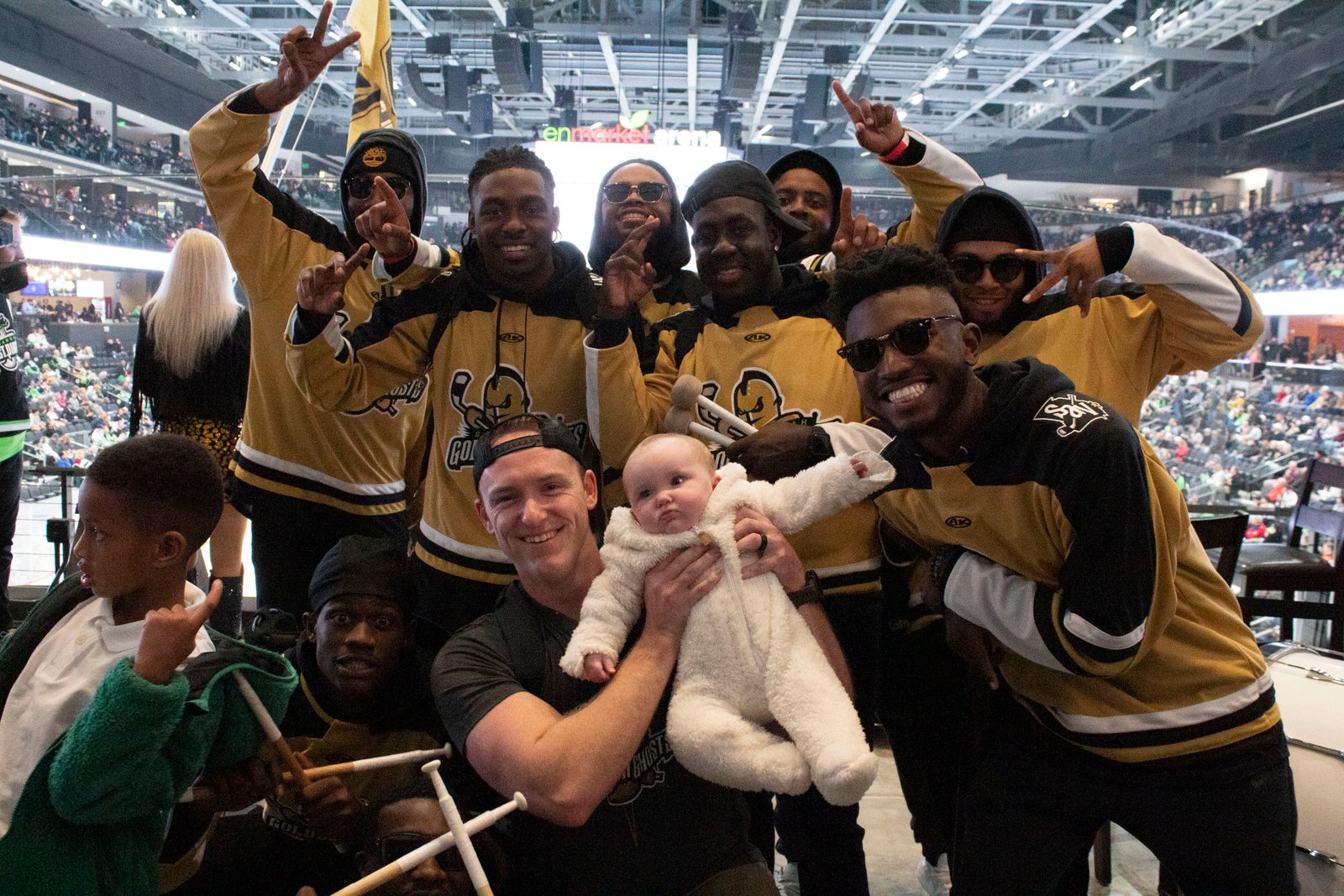 Golden Ghosts mascot and Vegas Golden Knights' Chance standing back to back on the ice